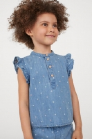 HM  Blusa denim estampada