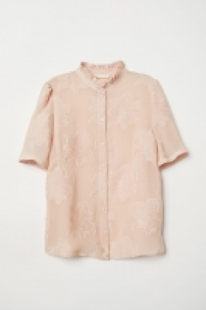 Blusa en tejido jacquard 23.99 €