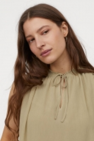 Blusa con detalle fruncido 6.99 €