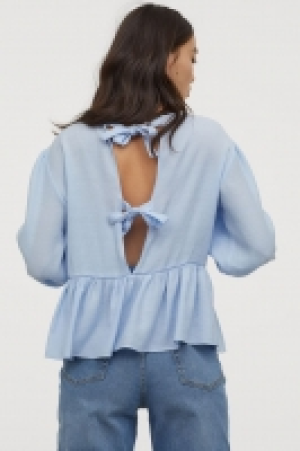 Blusa con mangas puffy 12.59 €
