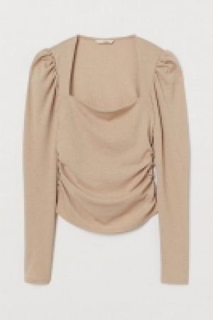 Top con mangas abullonadas 12.99 €