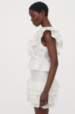 Falda de algodón con volantes 17.99 €