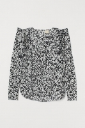 Blusa con mangas abullonadas 13.99 €
