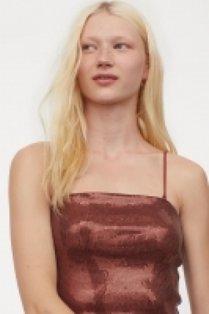 Top cropped con lentejuelas 8.99 €
