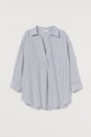 Blusa en mezcla de lino 14.99 €