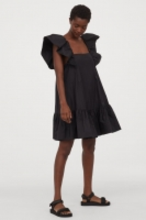 Vestido con manga circular 34.99 €
