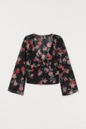 Blusa de gasa en V 13.99 €