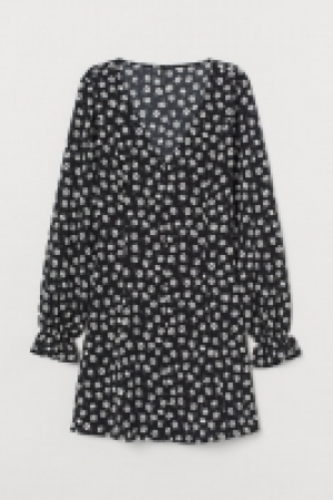 Vestido con escote de pico 11.99 €
