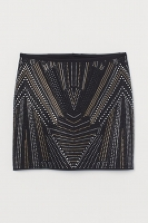 Falda con remaches 20.99 €