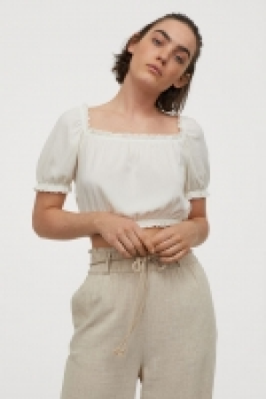Top cropped con manga puffy 3.99 €