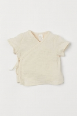 Camisa cruzada de algodón 10.99 €