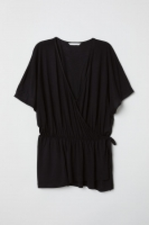 Top cruzado de punto 5.99 €