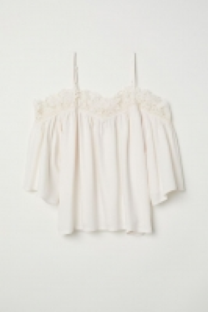 Blusa hombros cut-out 13.99 €