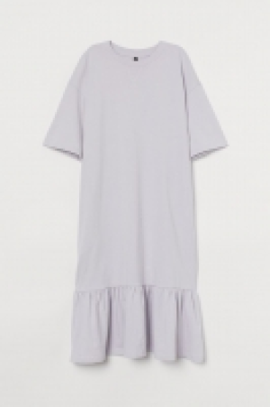 HM  Vestido camiseta con volante