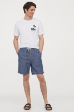 Pantalón corto en mezcla lino 11.99 €