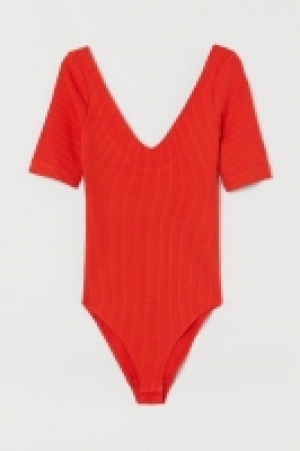 Body con escote de pico 12.99 €