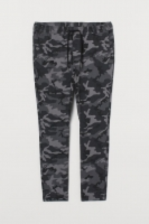 HM  Joggers estampados de algodón