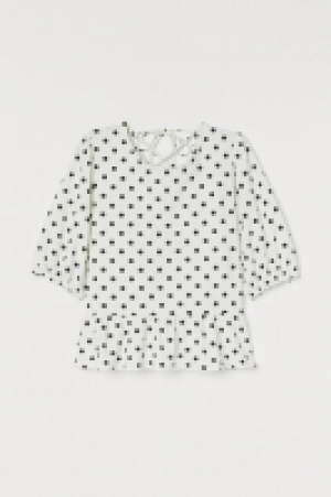 Top con peplo 10.99 €