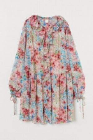 Vestido corto de volantes 12.99 €