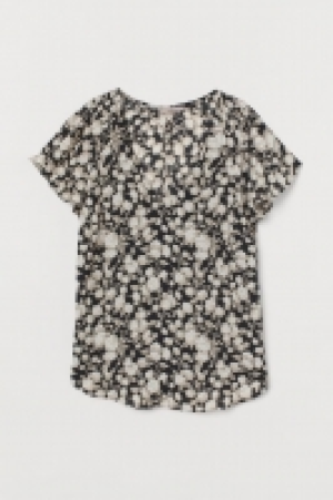 Blusa con manga circular 8.99 €