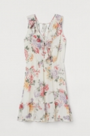Vestido corto de volantes 21.99 €