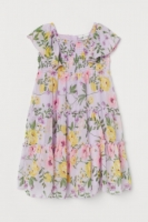 HM  Vestido floral con volantes