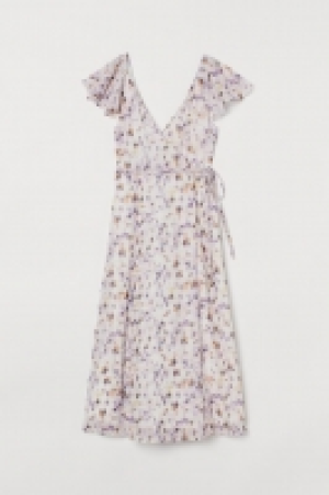 Vestido largo con escote en V 32.99 €