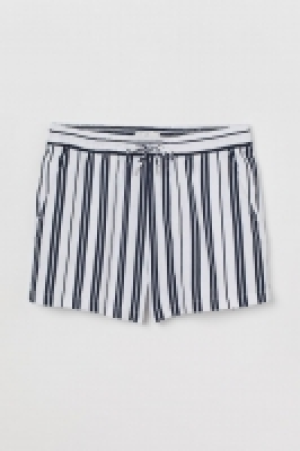 Pantalón corto en mezcla lino 9.99 €