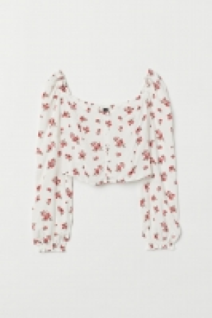 Blusa con mangas abullonadas 7.99 €