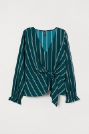 Blusa con lazada 13.99 €