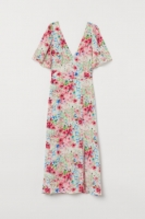 Vestido con mangas mariposa 24.99 €