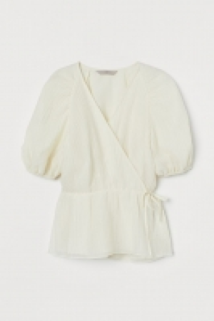 Blusa cruzada con lyocell 11.99 €
