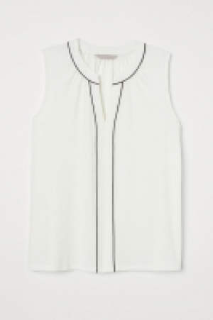 Top de punto con escote en V 5.99 €