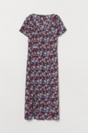Vestido con botones 11.99 €