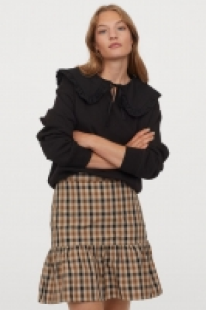 Falda de cuadros 10.99 €