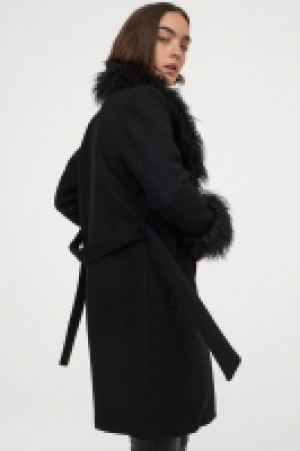 Abrigo con pelo sintético 34.99 €