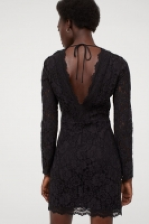Vestido de encaje escote de pico 21.99 €