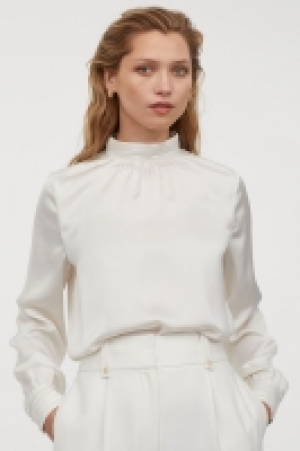 Blusa de satén 12.99 €