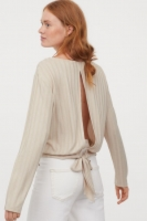 Top en crepé con lazada 6.99 €