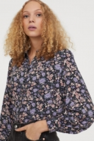 Camisa con mangas globo 8.99 €