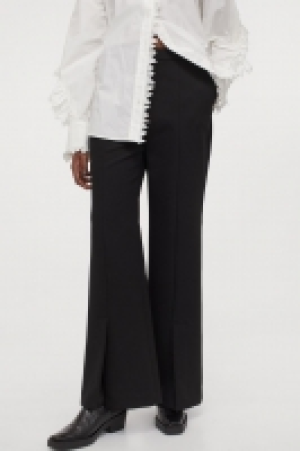 Pantalón acampanado 29.99 €