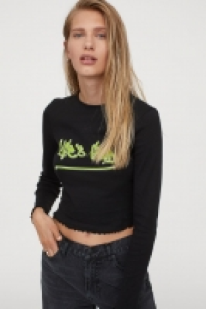Camiseta cropped con estampado 7.99 €