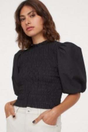 Blusa fruncida con manga puffy 5.99 €