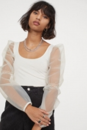 Top cropped con manga puffy 6.99 €