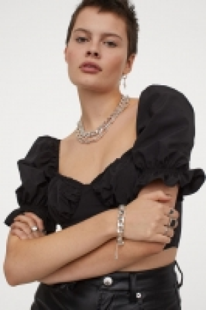 Top cropped con manga puffy 9.99 €
