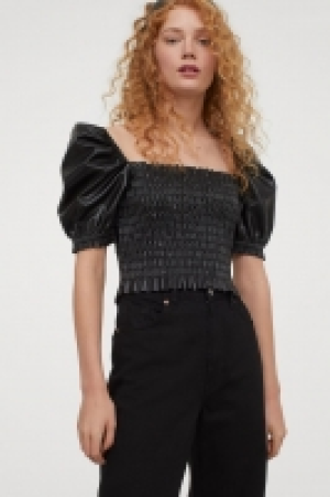 Blusa de piel sintética 12.99 €