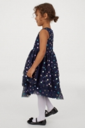 Vestido en tul brillante 14.99 €