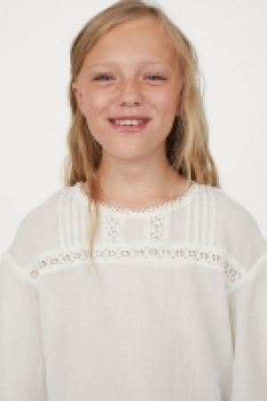Blusa en popelina de algodón 8.99 €