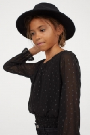 Blusa de gasa con lazada 8.99 €