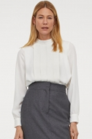 Blusa con pliegues 9.99 €
